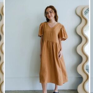 Piper & Scoot burnt orange midi dress with scalloped flutter sleeves